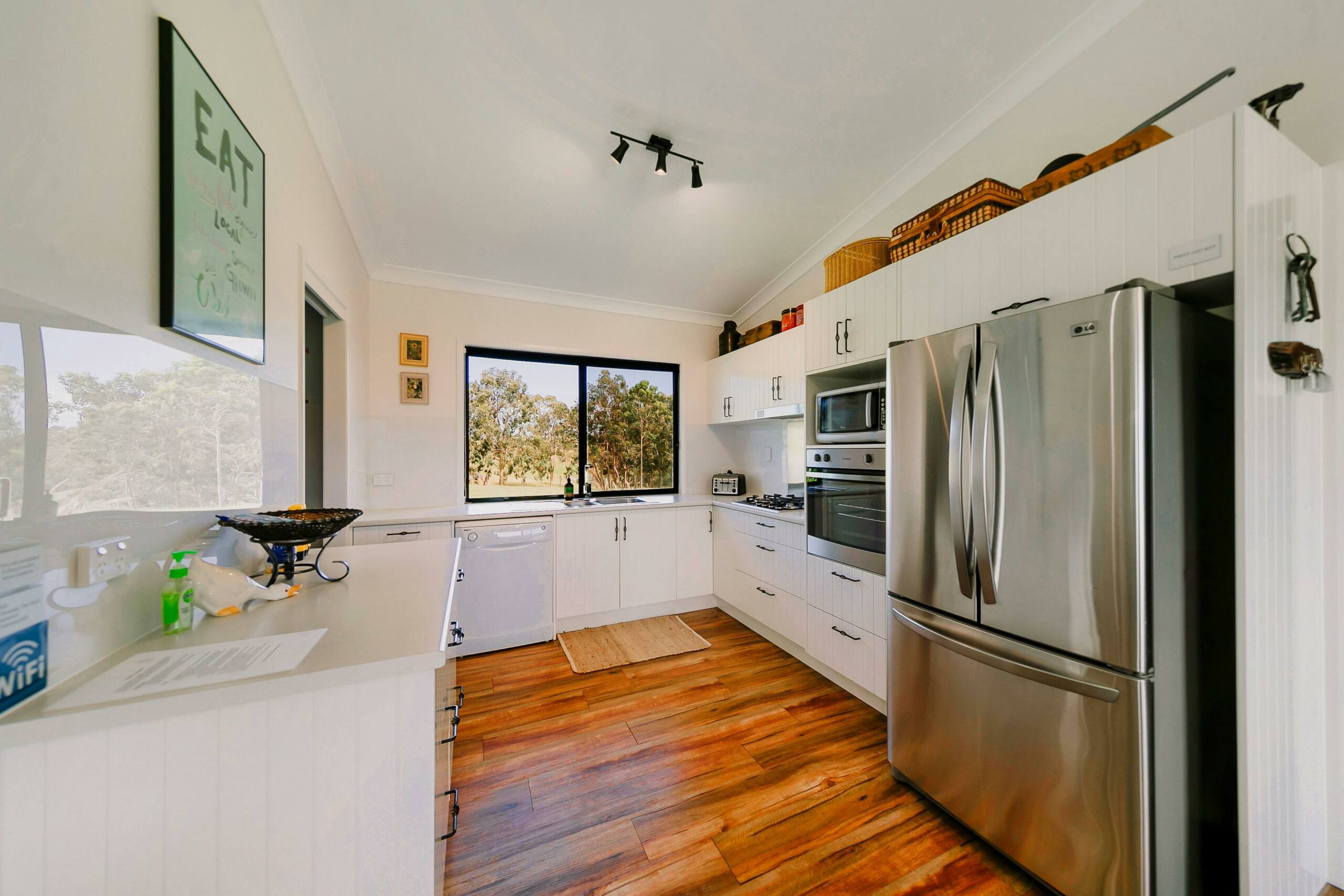 Gas cooktop, microwave, dishwasher, toasters, kettle, oven, fridge