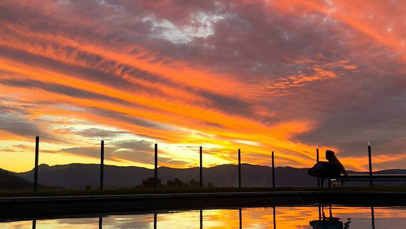 Unwind by the pool and soak in the stunning sunset views at Mount French Lodge