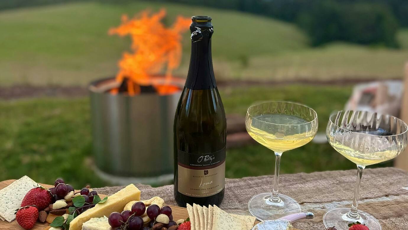 Charcuterie Box set out by the Outdoor Firepit at Pat's Farm Chalets.